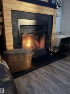 Wood-finish flooring throughout the room - 