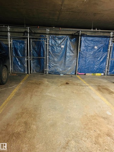 214 4304 139 Avenue, Edmonton, AB - Indoor Photo Showing Garage