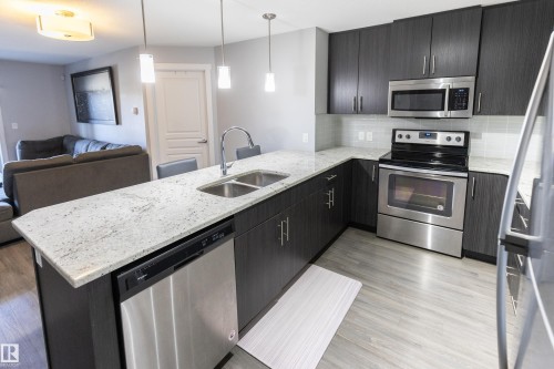 107 3670 139 Avenue, Edmonton, AB - Indoor Photo Showing Kitchen With Stainless Steel Kitchen With Double Sink With Upgraded Kitchen