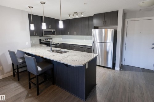 107 3670 139 Avenue, Edmonton, AB - Indoor Photo Showing Kitchen With Stainless Steel Kitchen With Double Sink With Upgraded Kitchen
