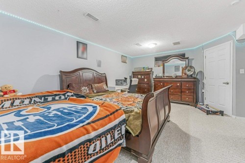 2317 27 Avenue, Edmonton, AB - Indoor Photo Showing Bedroom