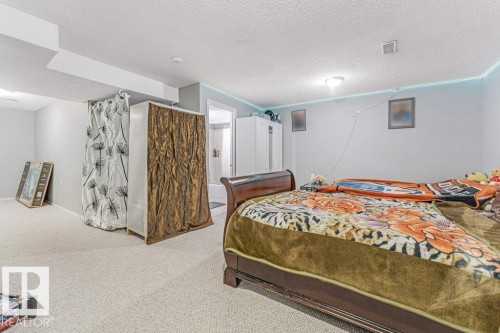 2317 27 Avenue, Edmonton, AB - Indoor Photo Showing Bedroom