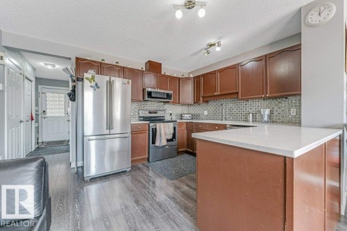 2317 27 Avenue, Edmonton, AB - Indoor Photo Showing Kitchen With Stainless Steel Kitchen With Upgraded Kitchen