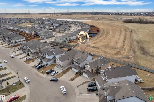 Aerial perspective showcasing a residential neighborhood with detached homes, paved streets, and a cul-de-sac - 3363 13 Avenue, Edmonton, AB - Outdoor With View