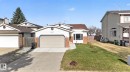 Single-story residence featuring a two-car garage, concrete driveway, and a bay window - 8403 190 Street, Edmonton, AB  - Outdoor With Facade 