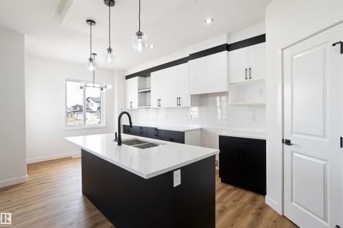 171 Munn Way, Leduc, AB - Indoor Photo Showing Kitchen With Double Sink With Upgraded Kitchen