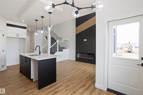 171 Munn Way, Leduc, AB - Indoor Photo Showing Kitchen With Double Sink With Upgraded Kitchen