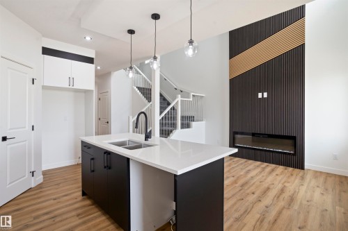 171 Munn Way, Leduc, AB - Indoor Photo Showing Kitchen With Double Sink With Upgraded Kitchen