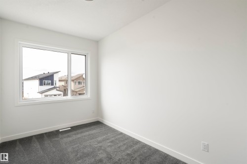 171 Munn Way, Leduc, AB - Indoor Photo Showing Other Room