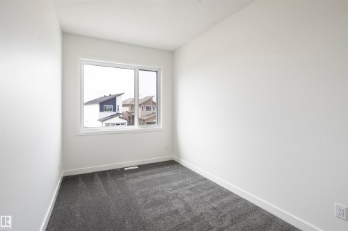 171 Munn Way, Leduc, AB - Indoor Photo Showing Other Room