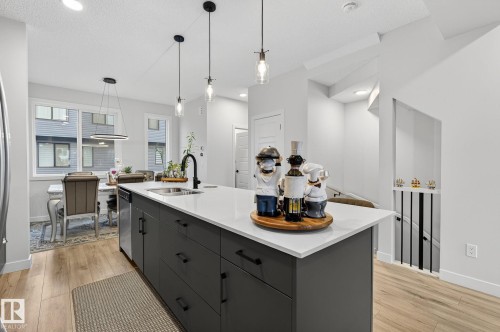 72 11910 35 Avenue, Edmonton, AB - Indoor Photo Showing Kitchen With Double Sink With Upgraded Kitchen