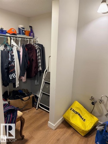 Image quality insufficient for description - 106 10725 111 Street, Edmonton, AB - Indoor With Storage