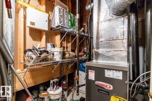 Lennox furnace with associated ductwork and water softener system - 47 1130 Falconer Road, Edmonton, AB - Indoor Photo Showing Basement