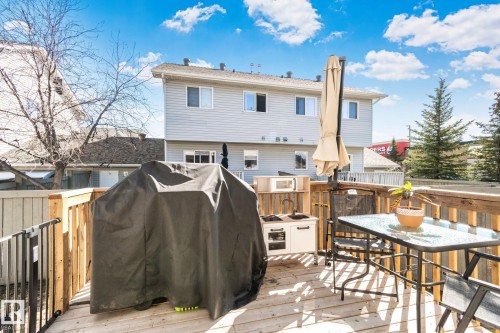 Expansive wood deck with a clear railing, offering outdoor living space - 53 2503 24 Street, Edmonton, AB - Outdoor With Deck Patio Veranda