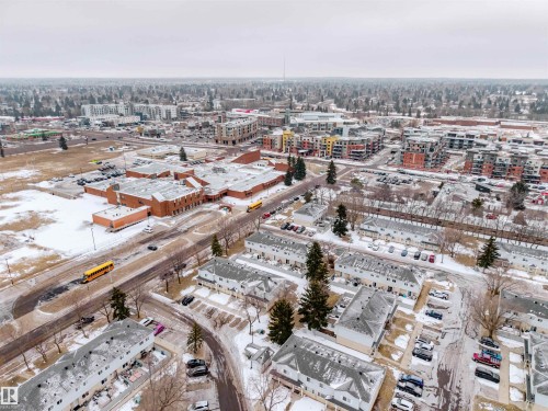 Aerial view showcasing the surrounding neighborhood, featuring a mix of residential buildings and commercial structures - Sherwood Park, AB - Outdoor With View