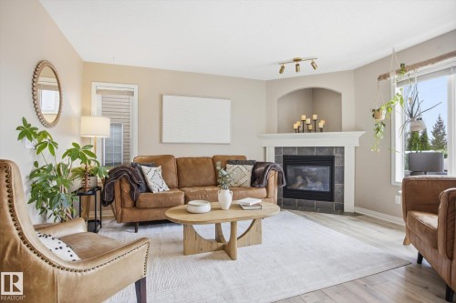 33 Grayridge Crescent, Stony Plain, AB - Indoor Photo Showing Living Room With Fireplace