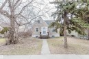 Single-family home with a stucco exterior and gabled roofline - 12223 127 Street, Edmonton, AB  - Outdoor 