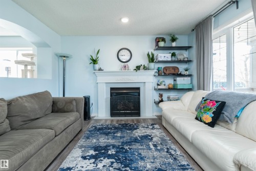 12204 18 Avenue, Edmonton, AB - Indoor Photo Showing Living Room With Fireplace