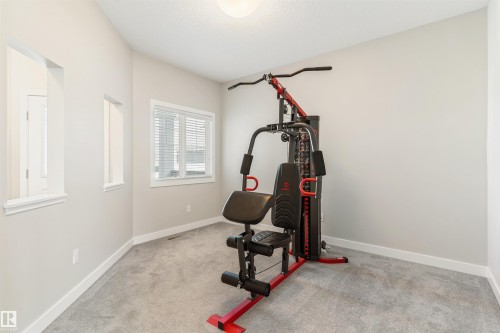 8011 Evans Crescent, Edmonton, AB - Indoor Photo Showing Gym Room