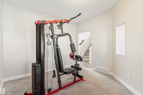 8011 Evans Crescent, Edmonton, AB - Indoor Photo Showing Gym Room