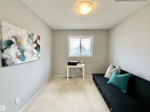 Neutral-toned walls complement light-colored carpet flooring - 17936 85 Street, Edmonton, AB - Indoor