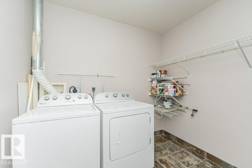 101 10809 Saskatchewan Drive, Edmonton, AB - Indoor Photo Showing Laundry Room