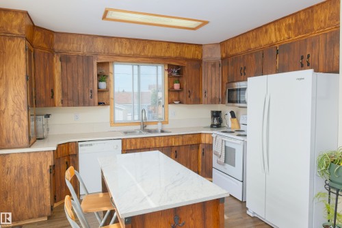 4904 43A Street, Barrhead, AB - Indoor Photo Showing Kitchen With Double Sink