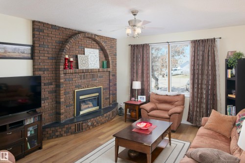 4904 43A Street, Barrhead, AB - Indoor Photo Showing Living Room With Fireplace