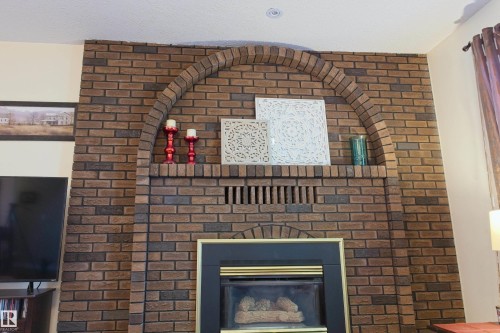 4904 43A Street, Barrhead, AB - Indoor Photo Showing Living Room With Fireplace