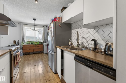 1 13454 Fort Road, Edmonton, AB - Indoor Photo Showing Kitchen With Stainless Steel Kitchen With Double Sink