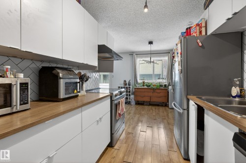 1 13454 Fort Road, Edmonton, AB - Indoor Photo Showing Kitchen With Double Sink
