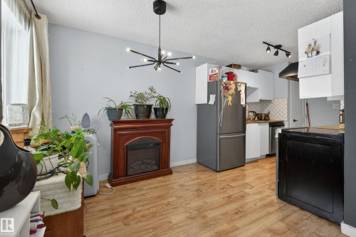 1 13454 Fort Road, Edmonton, AB - Indoor With Fireplace
