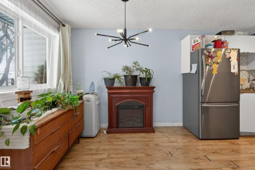 1 13454 Fort Road, Edmonton, AB - Indoor With Fireplace