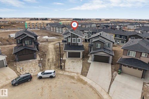 Contemporary two-story residence with a dark-toned exterior and contrasting trim - 4006 35 St, Beaumont, AB - Outdoor