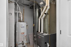 Dedicated utility closet housing the water heater and HVAC system - 
