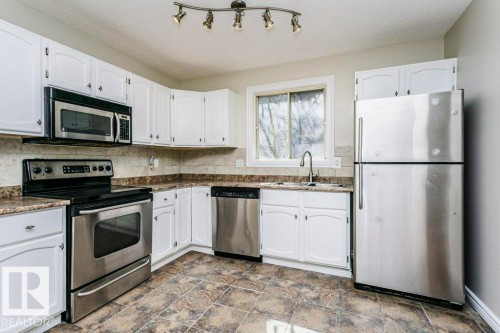 14304 32 Street, Edmonton, AB - Indoor Photo Showing Kitchen With Double Sink