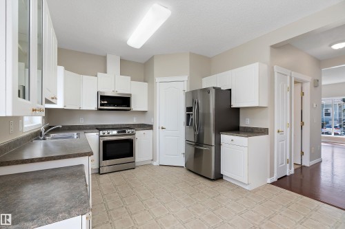 4 1780 Glastonbury Boulevard, Edmonton, AB - Indoor Photo Showing Kitchen With Double Sink
