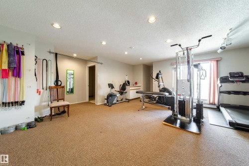 Dedicated fitness room featuring recessed lighting and a neutral color palette - 302 9138 83 Avenue, Edmonton, AB - Indoor Photo Showing Gym Room