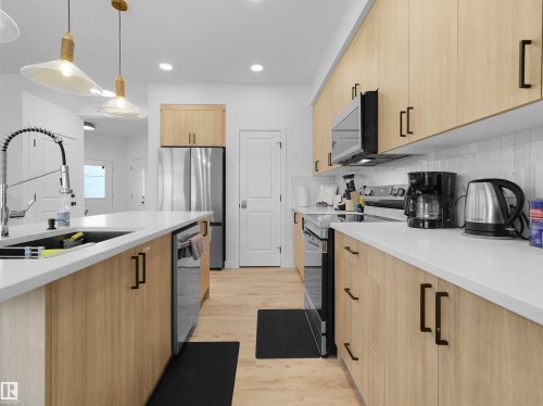 16252 19 Avenue, Edmonton, AB - Indoor Photo Showing Kitchen With Stainless Steel Kitchen With Upgraded Kitchen
