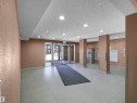 Spacious entryway featuring light-toned tile flooring and recessed lighting - 417 1060 Mcconachie Boulevard, Edmonton, AB  - Indoor Photo Showing Other Room 