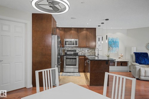 210 2204 44 Avenue, Edmonton, AB - Indoor Photo Showing Kitchen With Stainless Steel Kitchen With Upgraded Kitchen