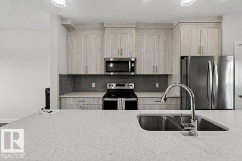 5052 Chappelle Road, Edmonton, AB - Indoor Photo Showing Kitchen With Stainless Steel Kitchen With Double Sink With Upgraded Kitchen