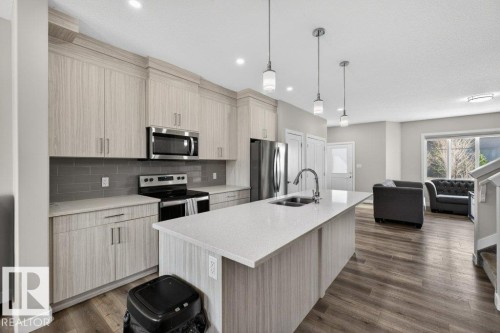 5052 Chappelle Road, Edmonton, AB - Indoor Photo Showing Kitchen With Stainless Steel Kitchen With Double Sink With Upgraded Kitchen