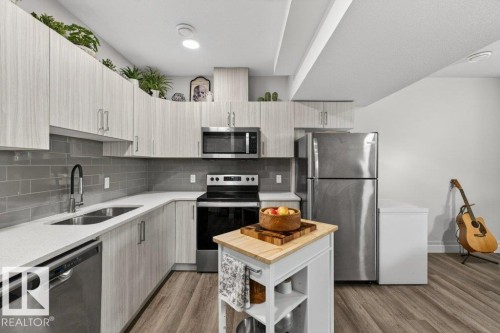 5052 Chappelle Road, Edmonton, AB - Indoor Photo Showing Kitchen With Stainless Steel Kitchen With Double Sink With Upgraded Kitchen
