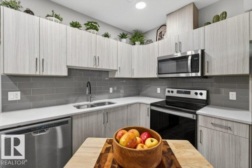 5052 Chappelle Road, Edmonton, AB - Indoor Photo Showing Kitchen With Stainless Steel Kitchen With Double Sink With Upgraded Kitchen