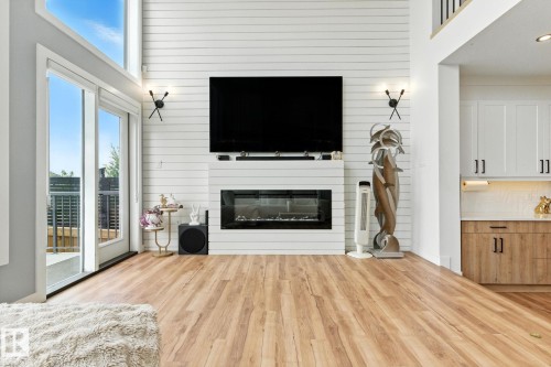 1048 Goldfinch Way, Edmonton, AB - Indoor Photo Showing Living Room With Fireplace