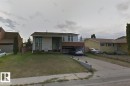 Split-level residence featuring a carport and driveway - 11507 141 Avenue, Edmonton, AB  - Outdoor 