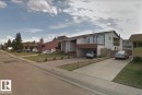 Split-level residence featuring white siding and brown trim - 11507 141 Avenue, Edmonton, AB  - Outdoor 