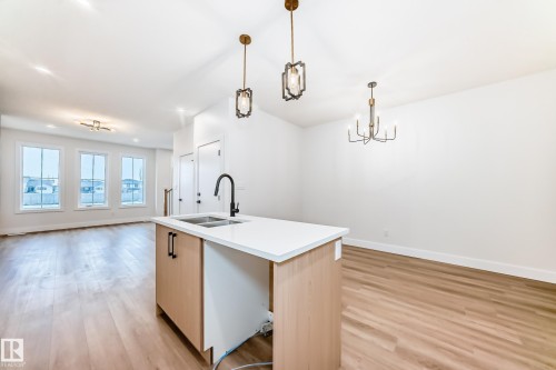 100 Elliott Wynd, Fort Saskatchewan, AB - Indoor Photo Showing Kitchen With Double Sink