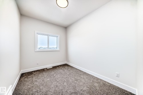 100 Elliott Wynd, Fort Saskatchewan, AB - Indoor Photo Showing Other Room